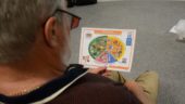 Diabetes Session, man with food card, Meridian Leisure Centre, Louth, Lincolnshire